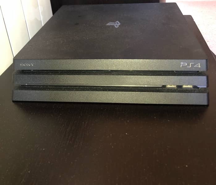 PS4 PRO with 3 controllers and 5 Games 0