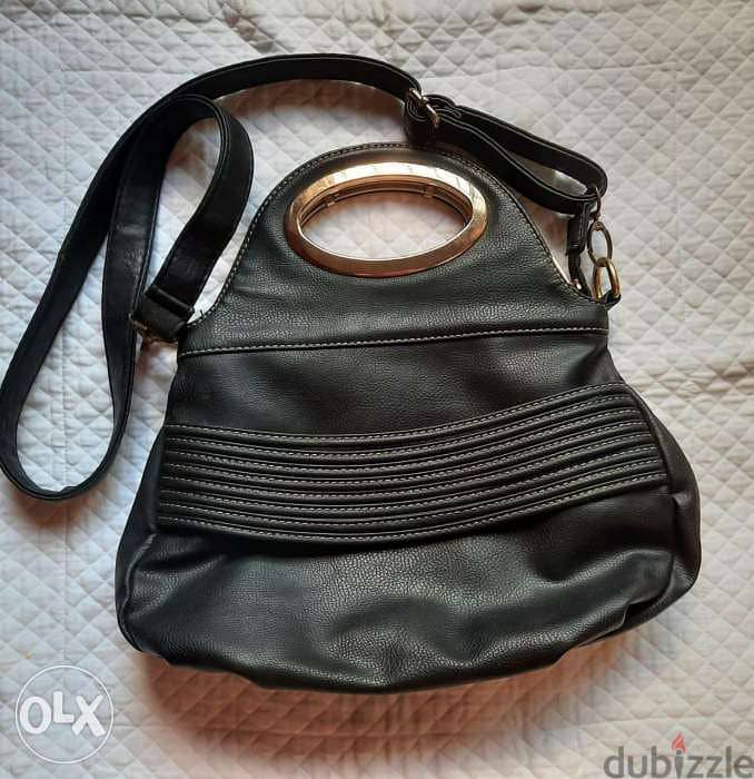 جزدان جلد جميل من الكويت 0