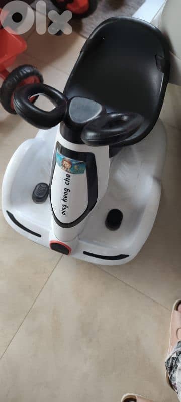 two cars and scooter 0