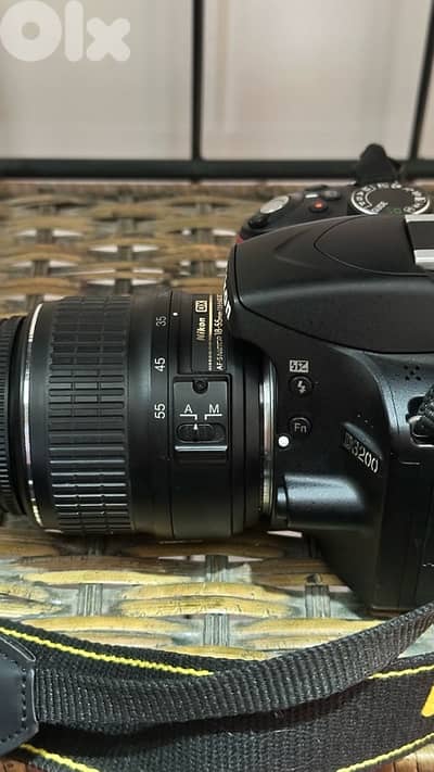 Nikon D3200 + عدسة 18-55mm