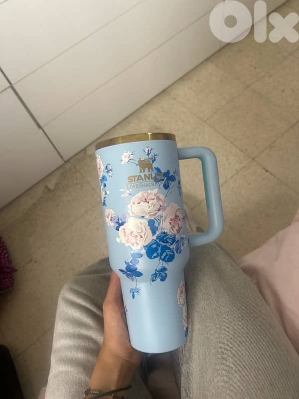 owala free sip water bottle and limited edition Stanley 0