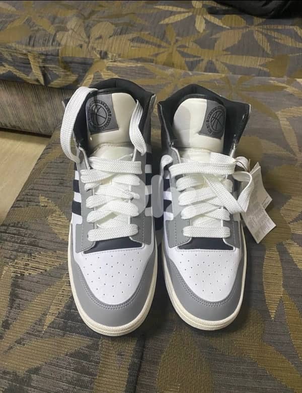 OriginalAdidas Rapid Court Mid trainers 0