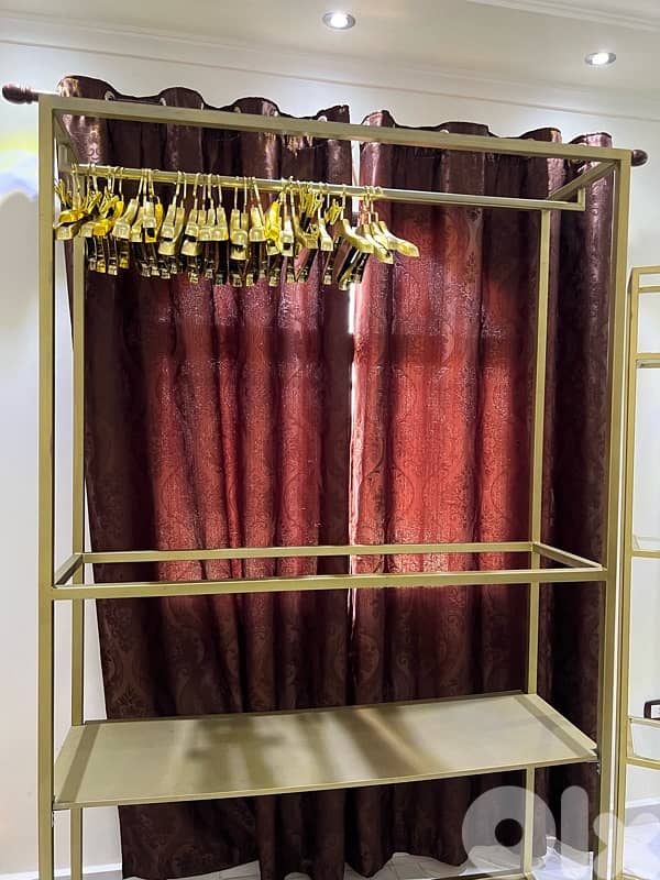 clothing shoes and bags stands 1