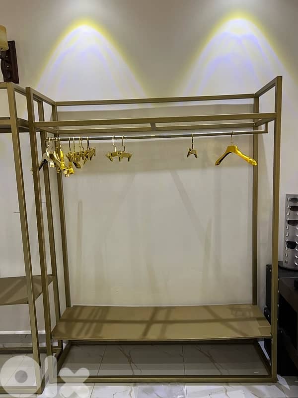 clothing shoes and bags stands 5