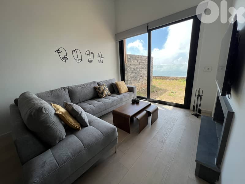 Elegant 2 Bedroom Chalet with Garden in Tilal Faqra 0