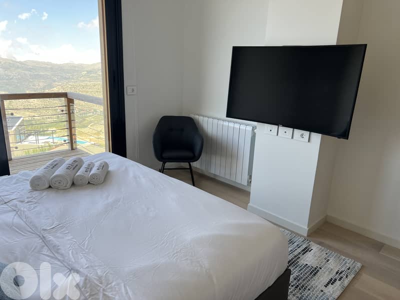 Elegant 2 Bedroom Chalet with Garden in Tilal Faqra 12