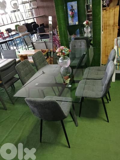 طاولة سفرة زجاج مع كراسي.   Dining table with chairs