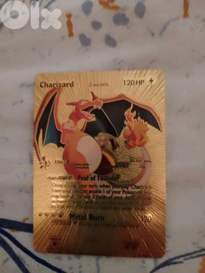 Charizard pokemon golden card.