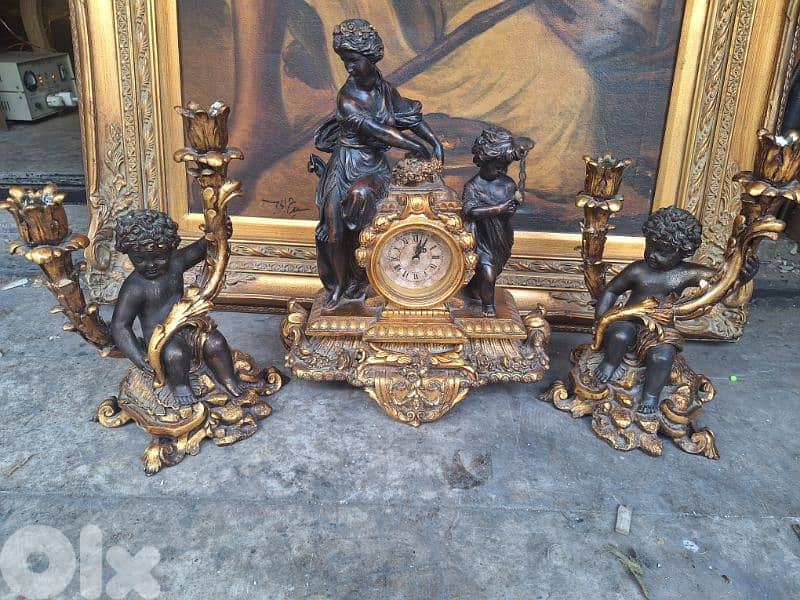 ساعة مع شمعدان عدد٢ تصميم مميز رائع جدا سعر لقطة 1