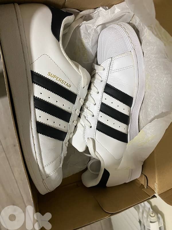 3 barely used nike and 1 adidas 3
