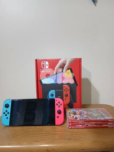 Nintendo Switch Oled Used one Month with 3 games
