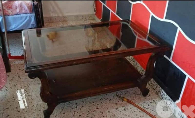 salon wooden table with a glass 1