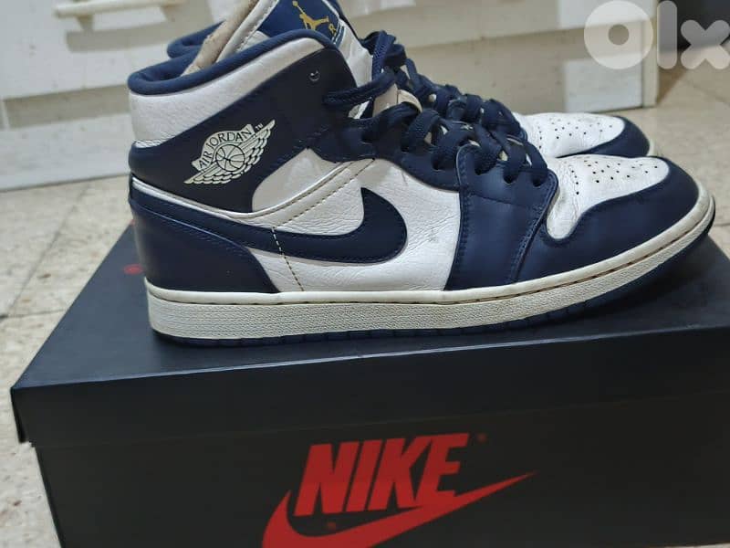 Jordan 1 Mid 1