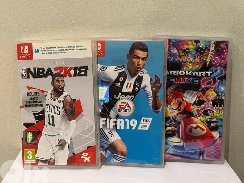 Nintendo switch (Accessories)  + bag + 6 CDS 1
