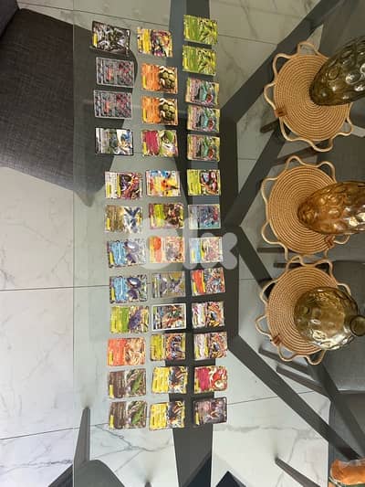 a bunch of pokemon cards (GX,EX,V)