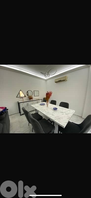 Dining table and 6 chairs