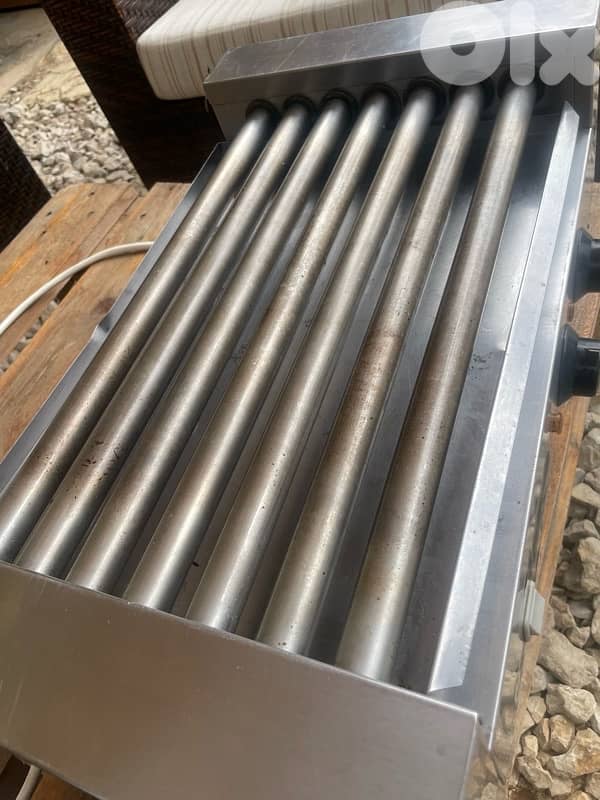 cheddar machine and hot dog grill 0