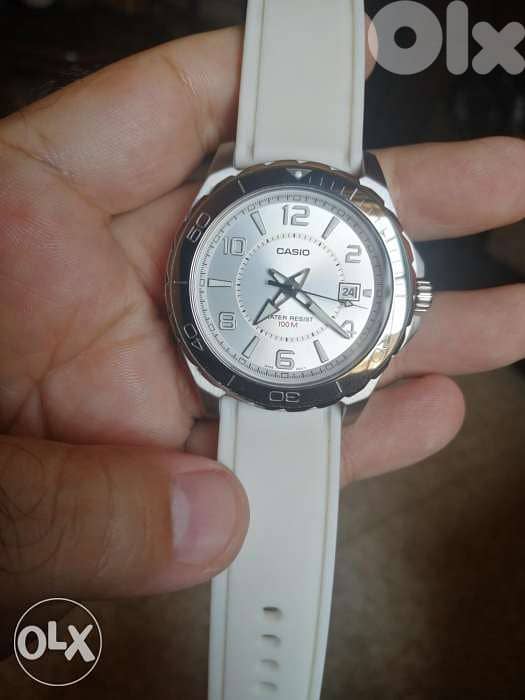 Casio analog white stainless steel. 0