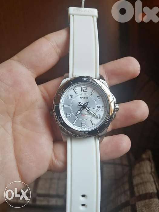 Casio analog white stainless steel. 1