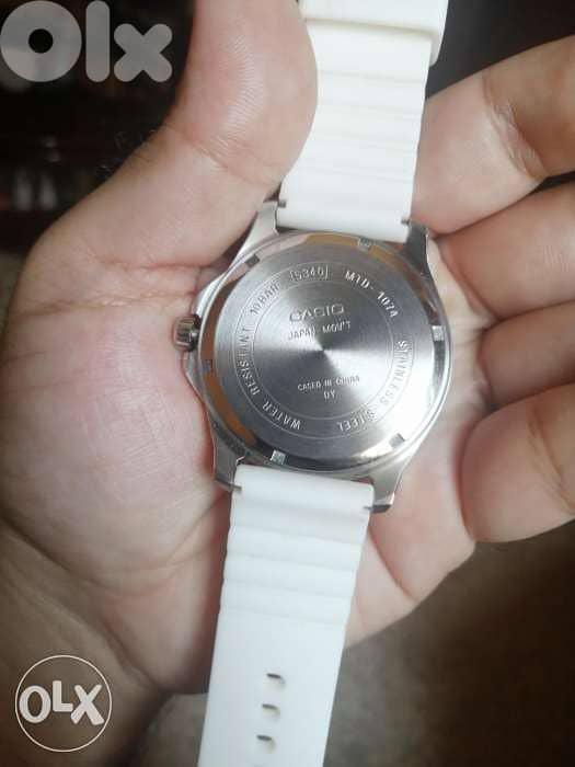 Casio analog white stainless steel. 2