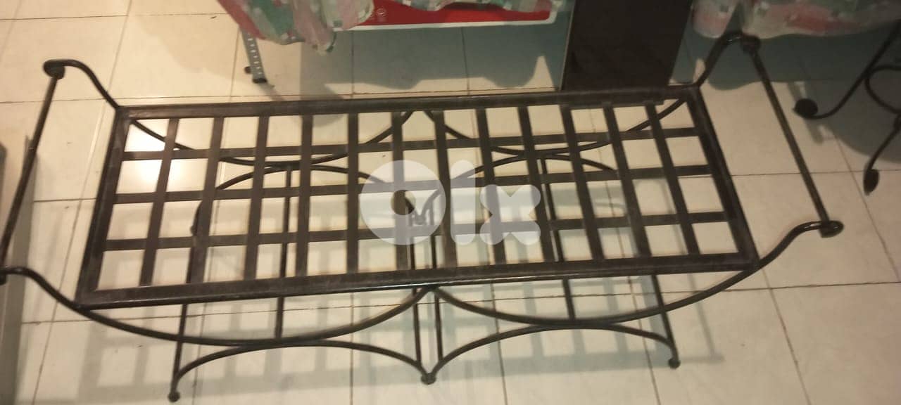 Iron couch and chair and stands for plants 0