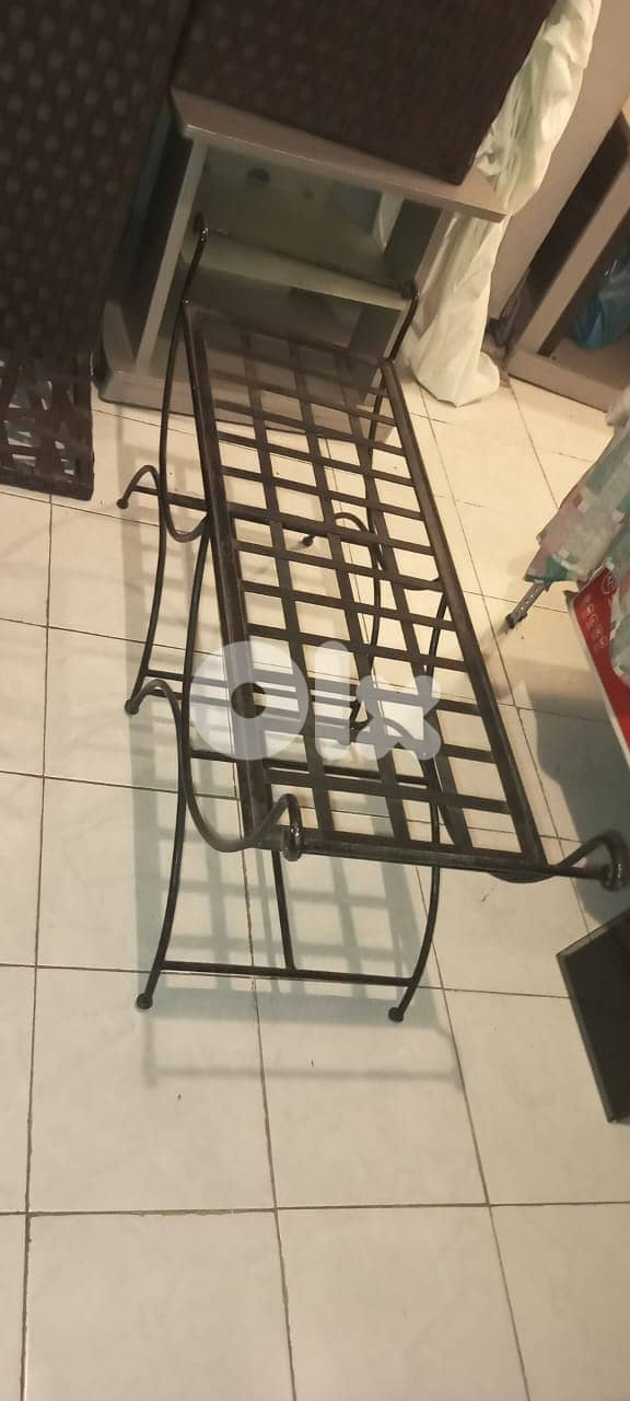 Iron couch and chair and stands for plants 1