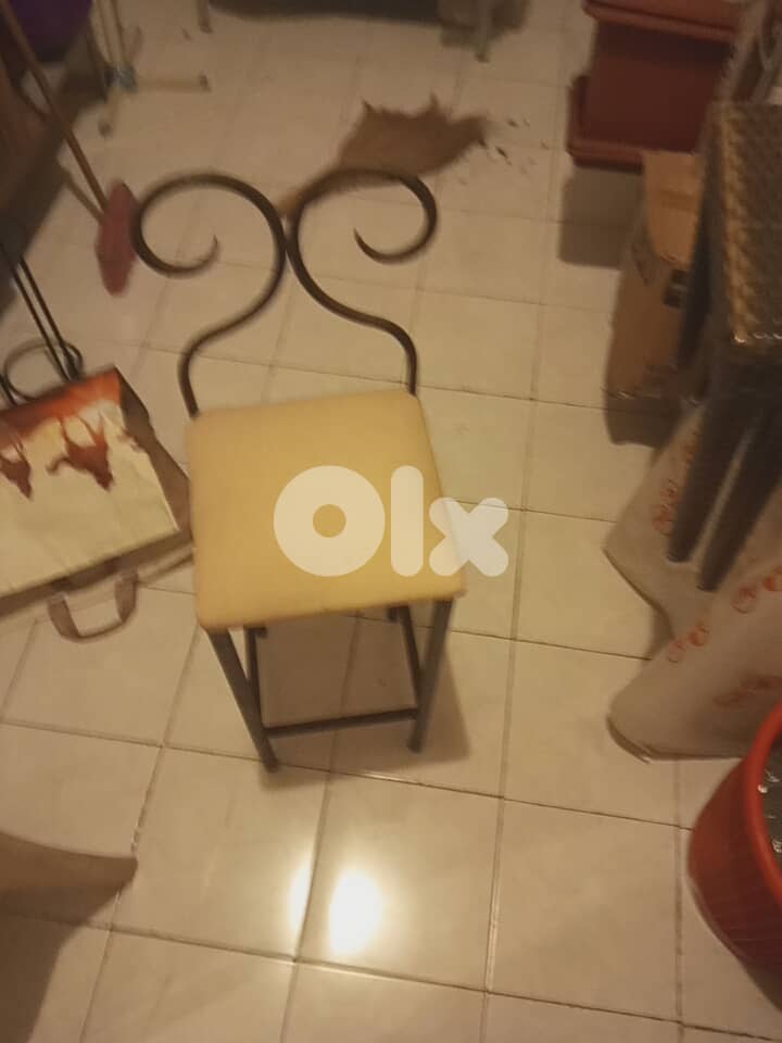 Iron couch and chair and stands for plants 5