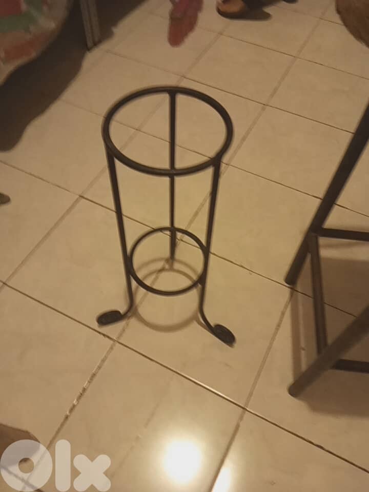 Iron couch and chair and stands for plants 7