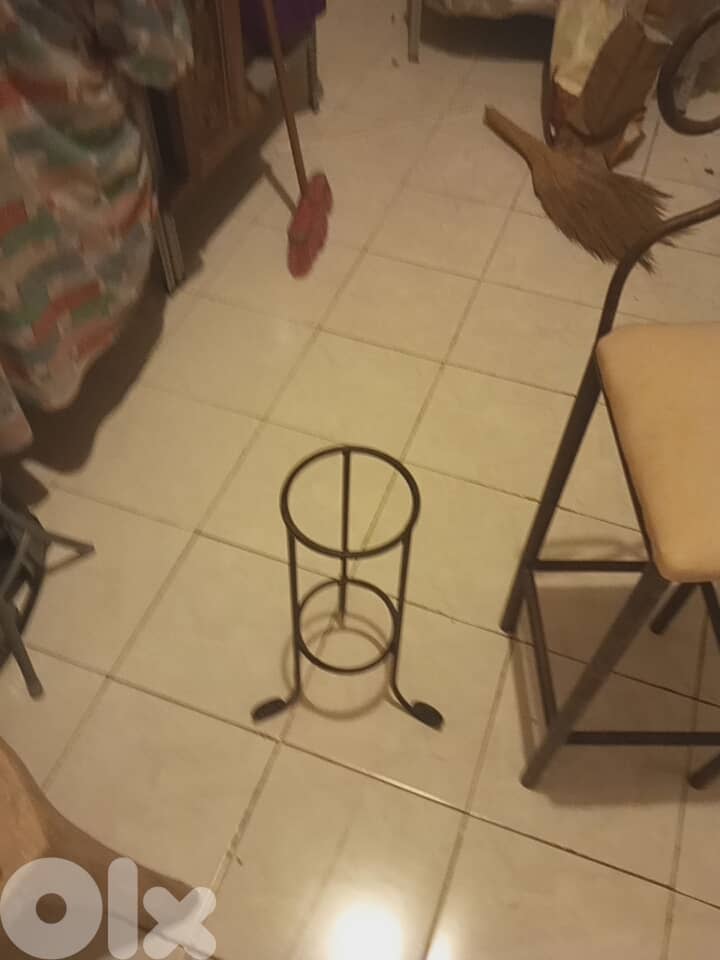 Iron couch and chair and stands for plants 8