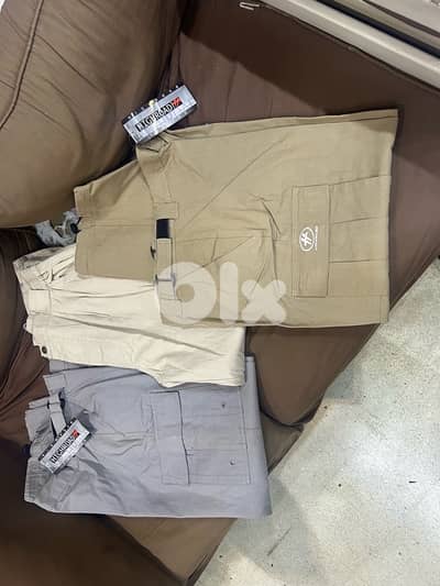 cargo pants . شروة ١٠٠ حبة