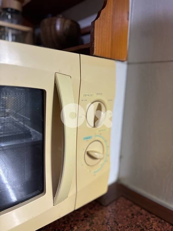 مايكرويف مستعمل شغال 100% Fully functional used Microwave 1