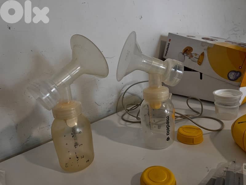 2 MILK BREAST PUMP MACHINES 1