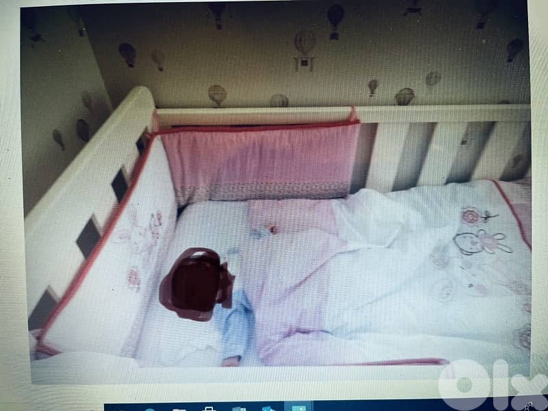 white baby crib 0