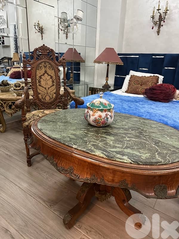 arm chair auntique and table 0