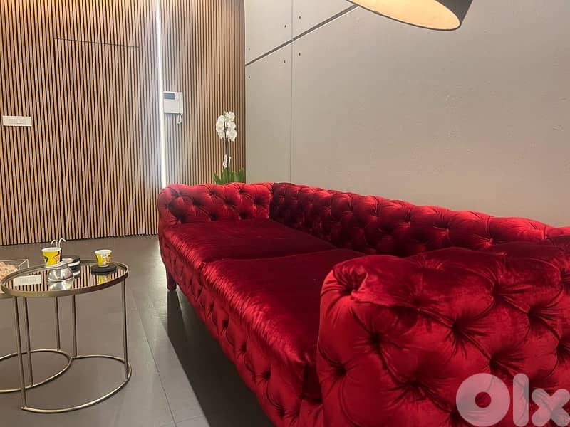 Red Velvet Chesterfield sofa 0