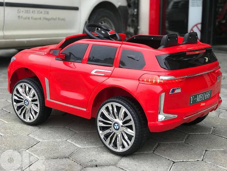 Red BMW X7 2 seat V12 4