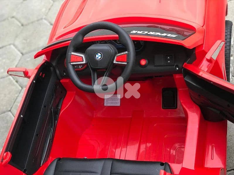 Red BMW X7 2 seat V12 5