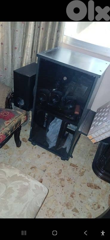 صالون ستيل+ ٤ طاولات +  طاولة تلفزيون + تلفزيون L G 9