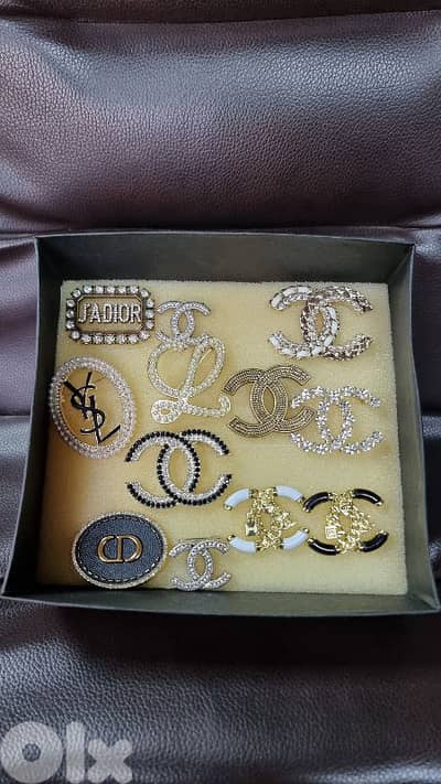 Branded brooches