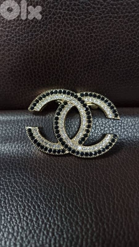 Branded brooches 1