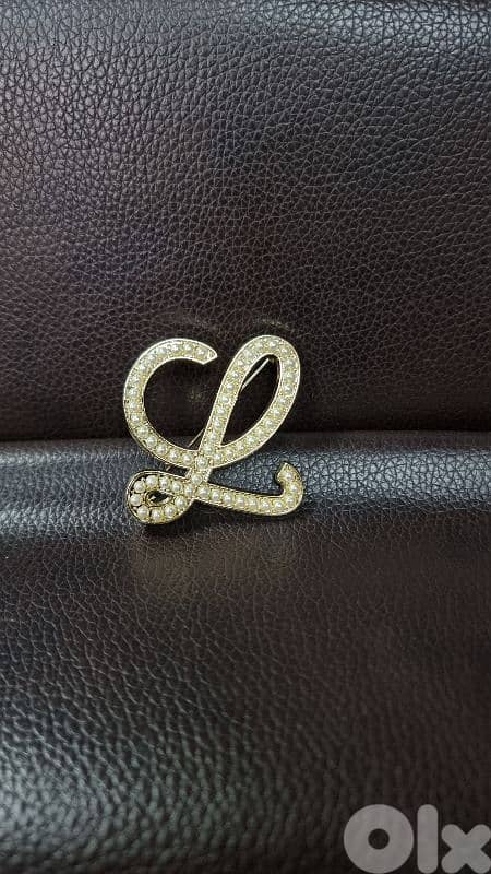 Branded brooches 3