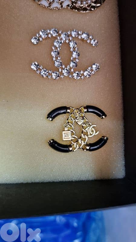 Branded brooches 6