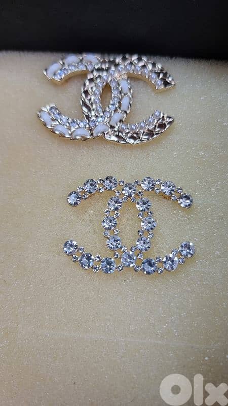 Branded brooches 7