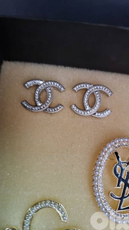 Branded brooches 8