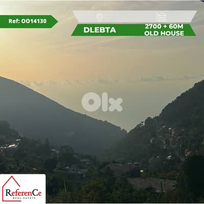 Land with old house in Dlebta أرض مع منزل قديم في دلبتا