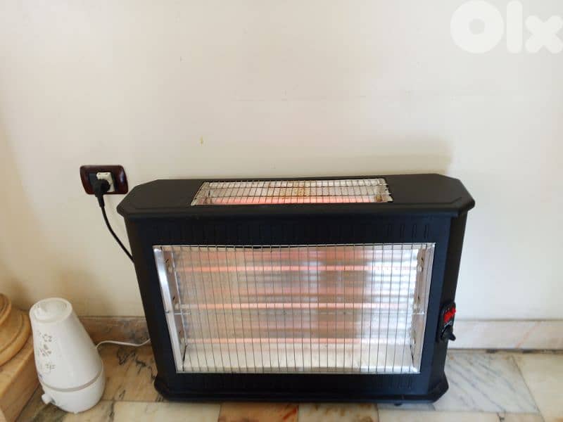 Kumtel KS-2710 electric space heater. 4
