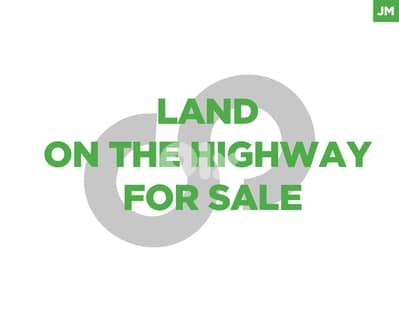 LAND ON JBEIL HIGHWAY FOR SALE REF#JM127520