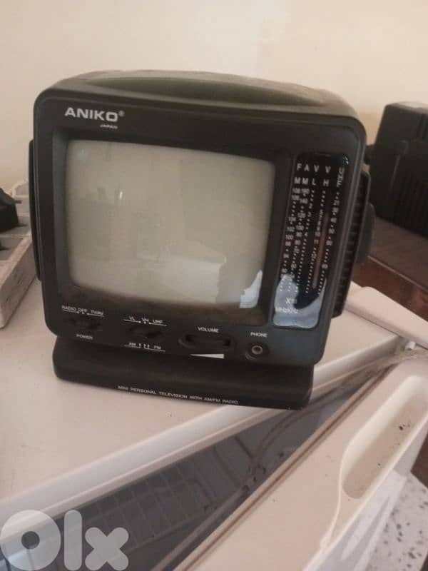 Aniko mini portable TV and AM/FM radio receiver model TV -328 0
