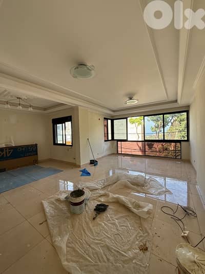 Decorated sunny apartment for rent in Naccache prime location.
