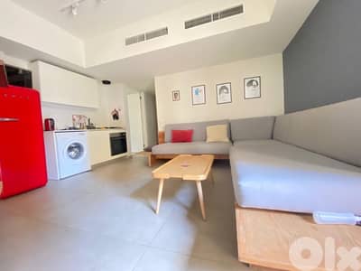 A furnished Apartment with a small terrace  for sale in Achrafieh.